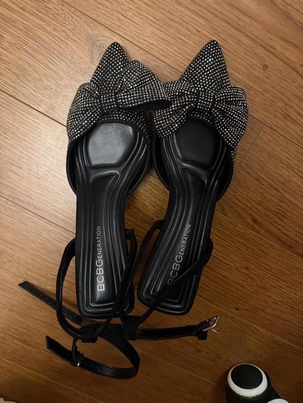 BCBGeneration Black Rhinestone Bow Pointed Flats with Ankle Straps